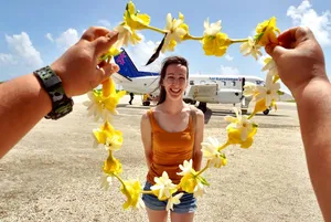 Atiu Airport Arrival Lei Flower (2) CREDIT cookislandspocketguide.com