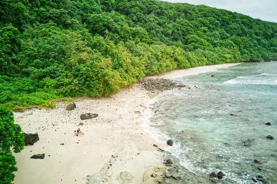 Fagamalo Beach Ta'u Landscape Couple CREDIT AmericanSamoaPocketGuide.com