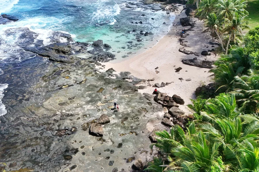Le'ala Shoreline Sliding Rock Best Tours Beach CREDIT AmericanSamoaPocketGuide.com