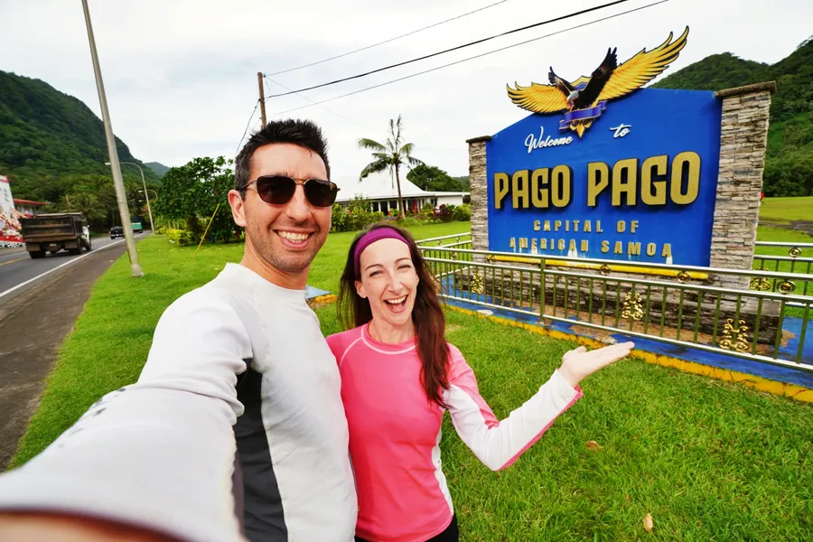 Pago Pago Sign Couple Selfie CREDIT AmericanSamoaPocketGuide.com