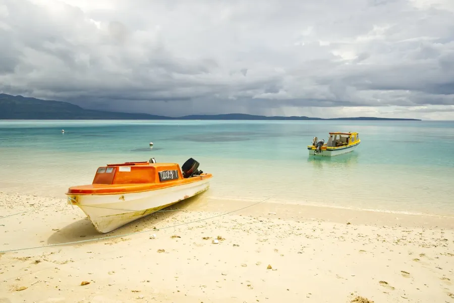 Pele Beach Boat Transport Landscape Efate CREDIT VanuatuPocketGuide.com