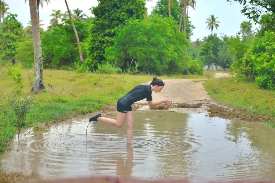 Swimming Road Pot Holes Driving CREDIT VanuatuPocketGuide.com