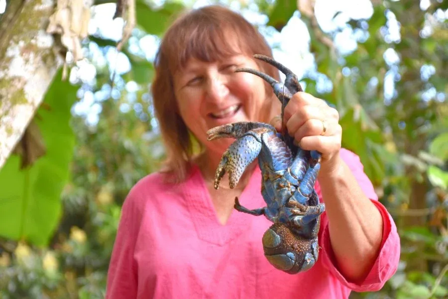Woman Holding Uga Crab Mandatory Credit To NiuePocketGuide.com Small 1